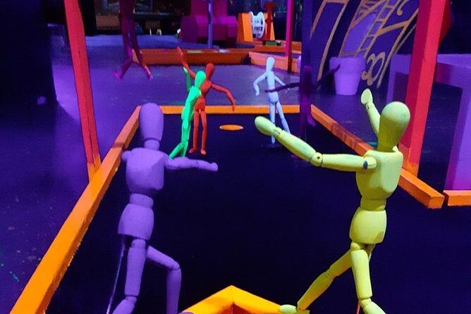 Prague Black Light Mini Golf and Games with free Drinks - The UV décor and face-paint glow effect: the photo part is actually good