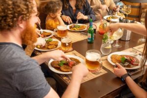 Prague by Night: Drinks & Food Tour with Eating Europe - Charles Bridge area: Seminář Café and the bread roll + garlic spread combo