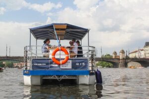 Prague Cycle Boat - The Swimming Beer Bike - The views you’re really buying: Charles Bridge and Prague Castle from water level