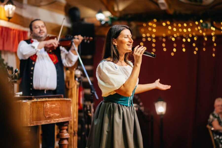 Prague: Dinner with Folk Show and Open Bar - Inside the typical Czech restaurant dinner setup