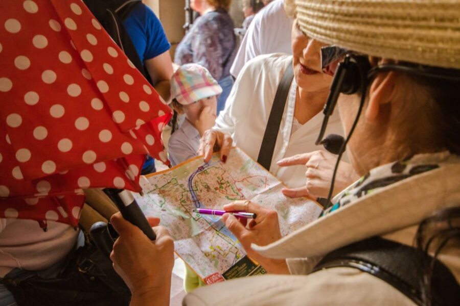Prague: Guided Bus & Walking Tour with River Cruise & Lunch - Hotel pickup and meeting point rules that can save you stress