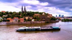 Prague: Sightseeing Dinner Cruise on Open-Top Glass Boat - Boarding at the Pier: Getting Positioned for Great Views